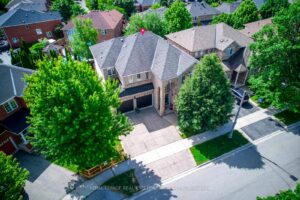 Aerial view of 2249 Glazebrook, Mississauga, showcasing the executive home on a quiet, tree-lined street.