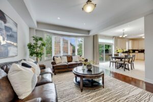 Open-concept family room at 2249 Glazebrook, Mississauga, seamlessly connected to the kitchen and breakfast area.