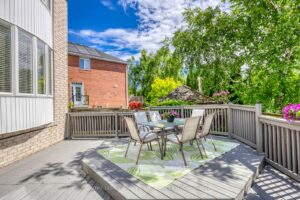 Raised outdoor dining area at 2249 Glazebrook, Mississauga, perfect for summer meals and entertaining guests.