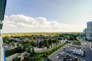 Scenic southwest view overlooking parks, city streets, and surrounding neighbourhood.