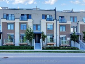 Front exterior of modern condominium residences at 3058 Sixth Line in Oakville.