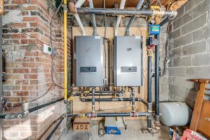 Building mechanical room featuring modern high-efficiency boiler and heating systems.