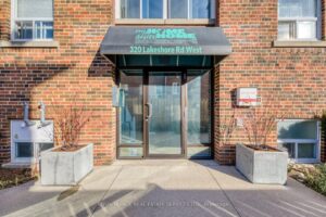 Secure main entrance to the residential building at 320 Lakeshore Road West in Oakville.