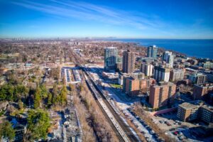 Aerial view of Oakville's lakeside community with nearby transit, downtown and Lake Ontario.