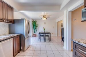 Breakfast area beside the kitchen with patio doors leading to the backyard.