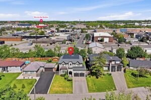 Aerial neighbourhood view highlighting nearby parks, residential streets, and surrounding amenities.